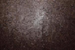 Pattern of 12 gauge cartridges for shotgun bullets. Shells for hunting rifle close up. Backdrop for shooting range or ammunition trade concepts photo