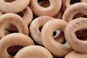 Close-up photo of fresh yellow bagels. A popular kind of flour products. One of the traditional Russian treats for tea