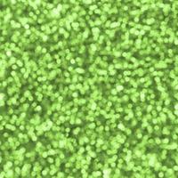 Blurred lime green decorative sequins. Background image with shiny bokeh lights from small elements photo