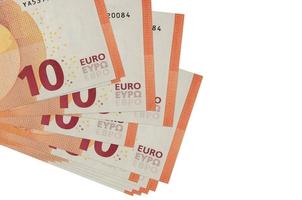 10 euro bills lies in small bunch or pack isolated on white. Mockup with copy space. Business and currency exchange photo