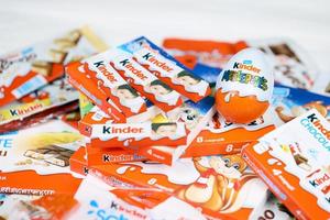 KHARKIV, UKRAINE - FEBRUARY 14, 2021 Kinder Chocolate various production. Kinder is a confectionery product brand line of multinational confectionery Ferrero. photo