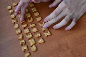 Hands on cracker keyboard buttons photo