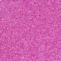Pink decorative sequins. Background image with shiny bokeh lights from small elements photo