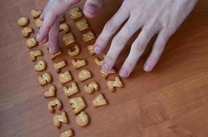 Hands on cracker keyboard buttons photo