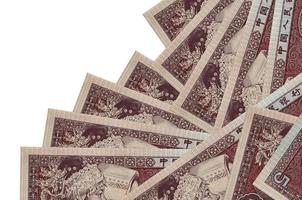 5 Chinese yuan bills lies in different order isolated on white. Local banking or money making concept photo