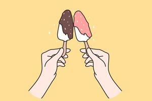 postres y concepto de comida dulce. manos humanas sosteniendo juntos helados con nueces y glaseado de chocolate sobre ilustración vectorial de fondo amarillo vector