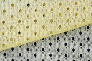 Yellow mesh sport wear fabric textile background pattern photo