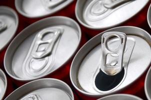 Many aluminium soda drink cans. Advertising for Soda drinks or tin cans mass manufacturing photo