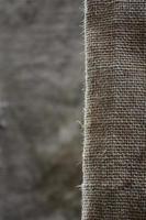 The texture of a very old brown sack cloth. Retro texture with canvas material. Background image with copy space photo