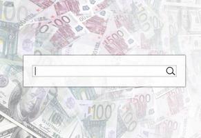 The search string is located on top of collage of many images of euro banknotes in denominations of 100 and 500 euros lying in the heap photo