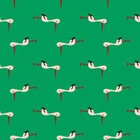 Small stork bird,seamless pattern on green background. vector