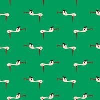 Small stork bird,seamless pattern on green background. vector