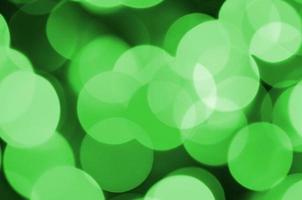 Navidad abstracta verde fondo luminoso borroso. imagen de luces bokeh artística desenfocada foto