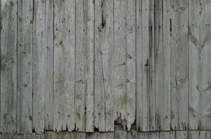 The texture of weathered wooden wall photo