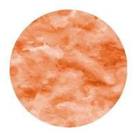 Orange hand drawn watercolor circular frame background texture with stains photo