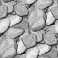 Seamless pattern with white stones, gravel texture photo