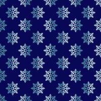 Seamless vector pattern of small blue snowflakes on dark blue background for printing, textile, web sites, fabric, wallpapers. Winter, Christmas and New Year concept