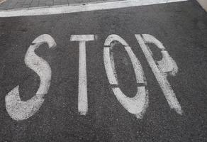 stop sign on tarmac photo