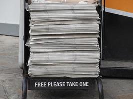 Free please take one newspaper photo