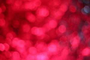 fondo de bokeh rojo, resumen de bokeh rojo perfecto para el fondo del día de San Valentín por venir. foto