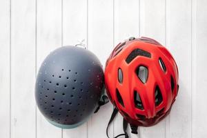 choice between two helmets, for riding and for cycling for the child photo