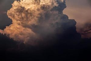 An orange cloud formed a rain cloud one evening photo