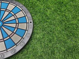 Dart with grass green background. photo