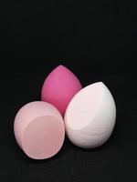 Make up sponge or beauty blender is a tool for applying foundation and other makeup products. photo