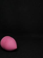 Make up sponge or beauty blender is a tool for applying foundation and other makeup products. photo