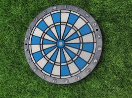 Dart with grass green background. photo
