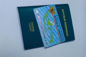 Indonesian green passport and Indonesian identity card owned by Indonesian citizens. photo
