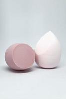 Make up sponge or beauty blender is a tool for applying foundation and other makeup products. photo