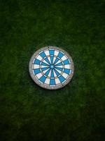 Dart with grass green background. photo