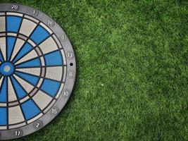 Dart with grass green background. photo