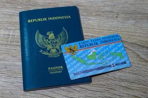 Indonesian green passport and Indonesian identity card owned by Indonesian citizens. photo