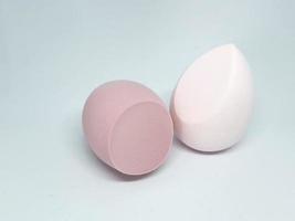 Make up sponge or beauty blender is a tool for applying foundation and other makeup products. photo