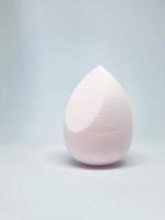 Make up sponge or beauty blender is a tool for applying foundation and other makeup products. photo