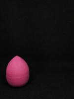 Make up sponge or beauty blender is a tool for applying foundation and other makeup products. photo