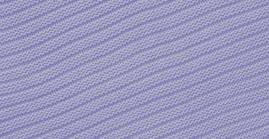 Texture of smooth knitted sweater with pattern. Handmade knitting wool or cotton fabric texture. Background of knitting patterns with horizontal stripes. photo