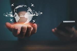 Man using mobile phone and holding Global network connection, Big data analytics and business intelligence, global business.Digital link technology. photo
