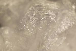 Texture of plastic bag. Transparent polyethylene. photo