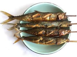 grilled fish on a plate photo