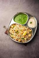 Sabudana Khichadi - An authentic dish from Maharashtra made with sago seeds, served with curd photo