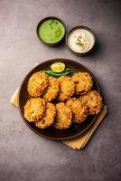 sabudana wada or shabudana vada called in india made from sago and served with chutney photo