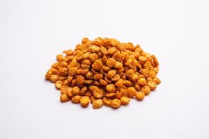 Fried and Spicy Chana Dal Masala namkeen is a popular Chakna recipe. served in a bowl photo