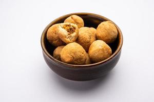 Dry kachori is a dry fruits stuffed ball shaped farsan also called kachauri, kachodi and katchuri photo