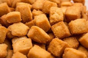 Shankarpali, shakkarpara, murali, khurma, lakdi mithai, or simply mithai is an Indian sweet snack photo