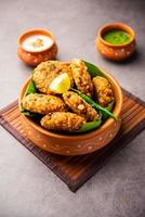 sabudana wada or shabudana vada called in india made from sago and served with chutney photo