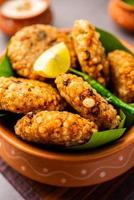 sabudana wada or shabudana vada called in india made from sago and served with chutney photo