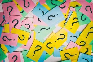 colorful paper notes with question marks. Closeup photo